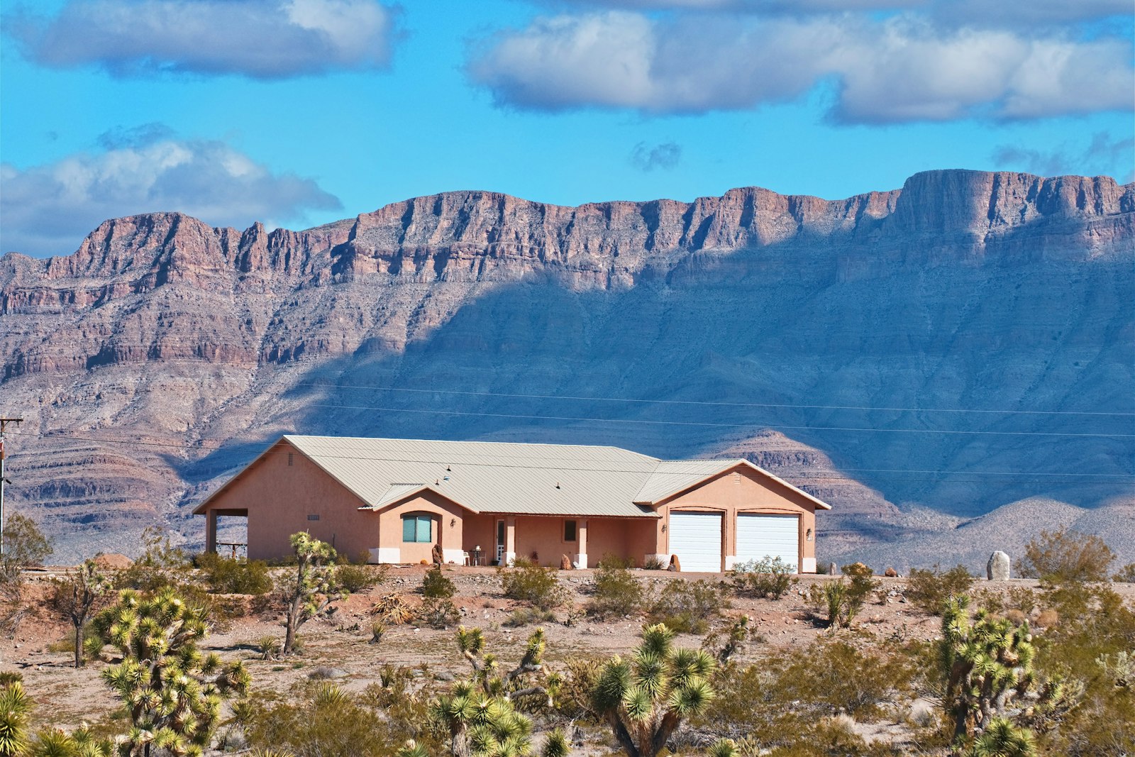 Arizona residential home exterior with desert landscaping and mountain backdrop appraised by 3:16 Appraisals